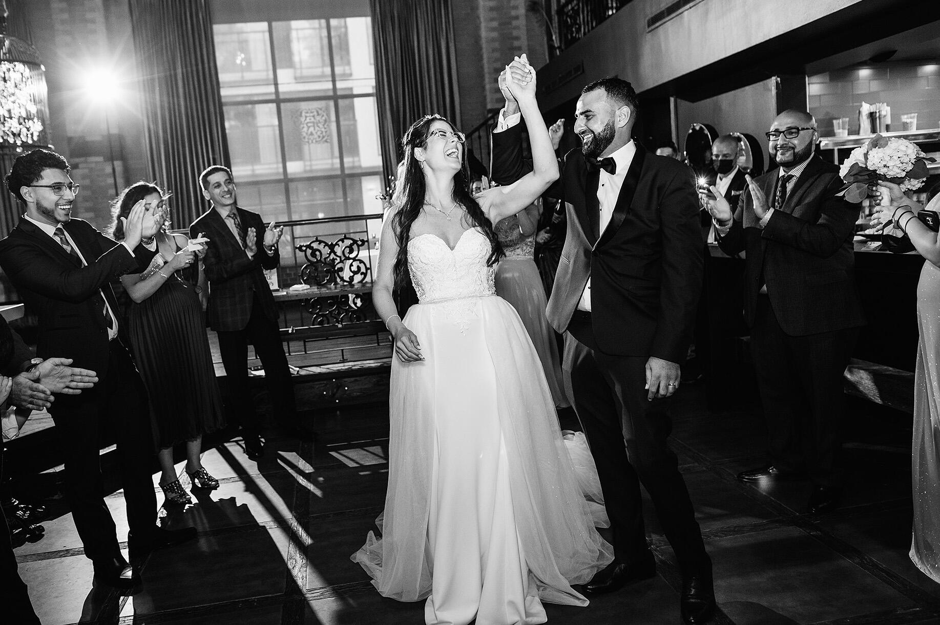 Bride and Groom dancing Bride and groom dancing at their wedding, black and white image.
